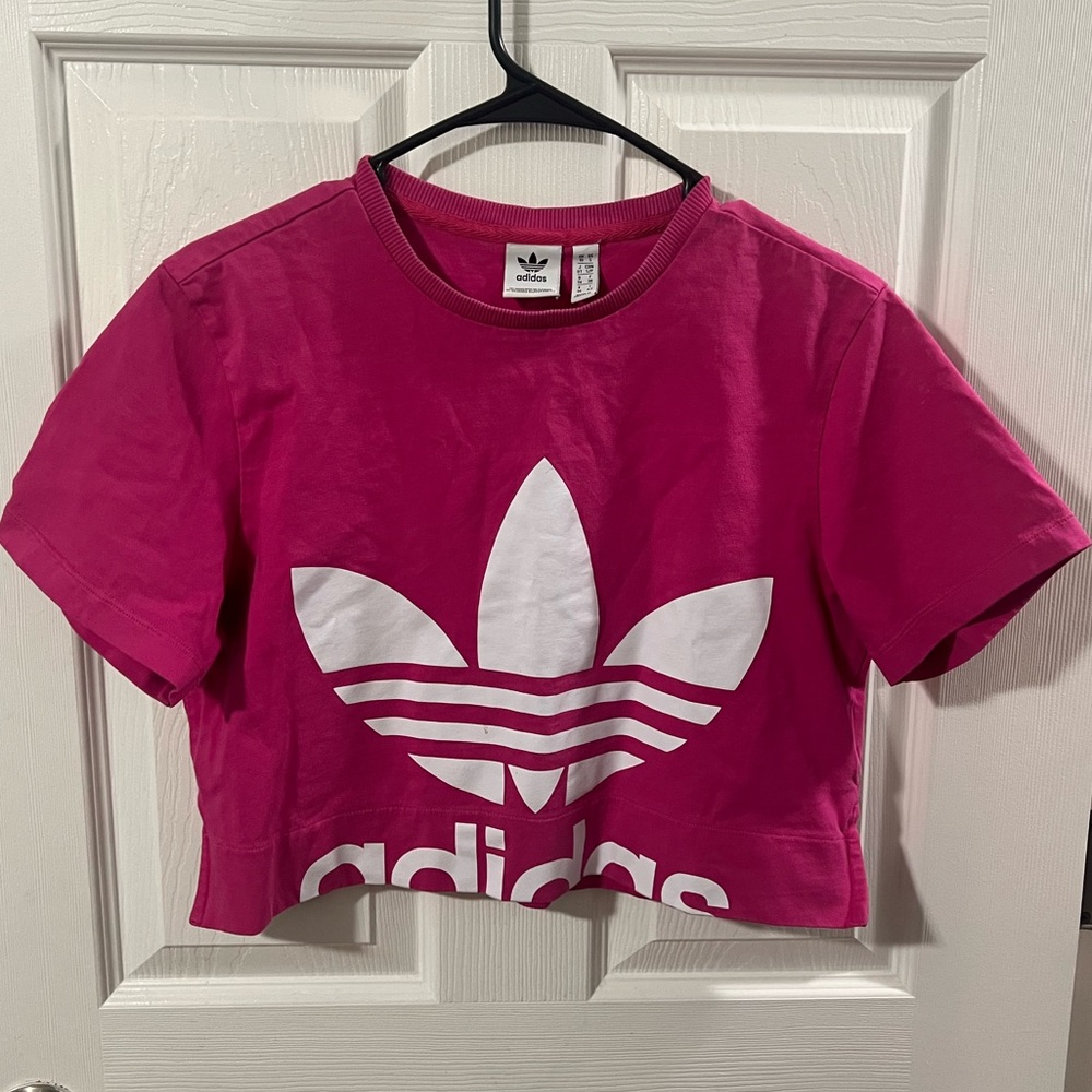 Adidas pink crop top with large logo design and short sleeve. Size S